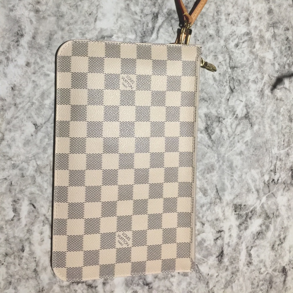 LV POCHETTE wristlet from Neverfull